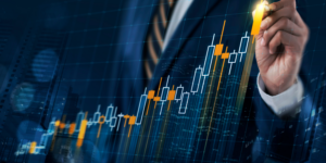 Un homme qui regarde l'évolution de ses actions en bourses.